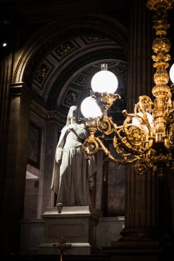 Religious statue from inside the Church of the Madeleine in Paris 2 clipart