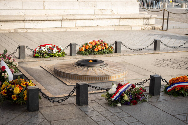 The flame of the unknown soldier under the arches of the Arc de Triomphe in Paris - 2 - Paris, France