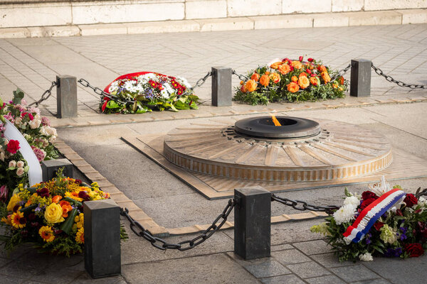 The flame of the unknown soldier under the arches of the Arc de Triomphe in Paris - 3 - Paris, France