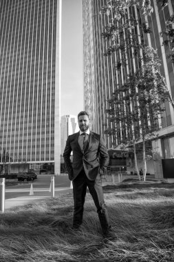 successful man in formalwear outside the office, full length, employee.
