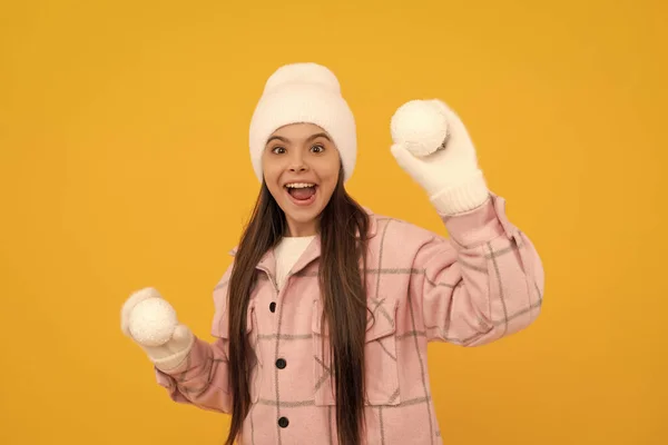 Amazed Child Hat Mittens Playing Snowballs Yellow Background Childhood — 图库照片