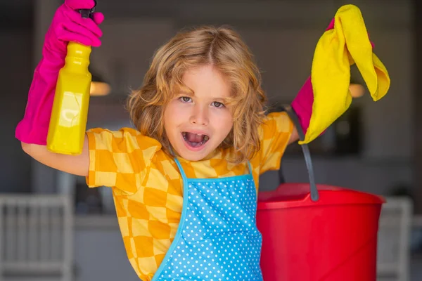 Portrait of child helping with housework, cleaning the house. Housekeeping, home chores