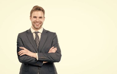Im young professional. Confident professional employee isolated on white. Happy man keep arms crossed. Businessman in suit, copy space.