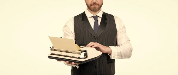 cropped secretary man typing on vintage typewriter, journalism.