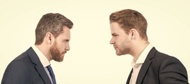 Man face portrait, banner with copy space. two businessmen starring to each other in business conflict, opposition