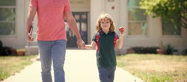 Banner of child back to school, nerd with teacher hold apple. education. first day at school. father and son come back from school.