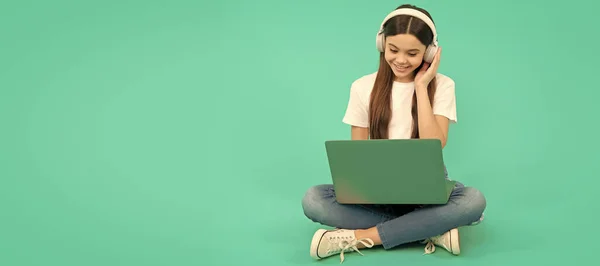 stock image childhood development. child chat on laptop. buy online. back to school. teen influencer blogging. happy girl in headphones. webinar in wireless headset. modern education. communication technology.