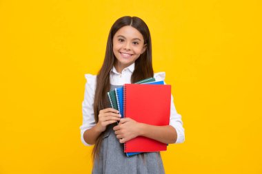 Teenager school girl study with books. Learning knowledge and kids education concept. Happy schoolgirl face, positive and smiling emotions