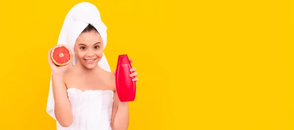 Cheerful Girl Towel Grapefruit Shampoo Bottle Yellow Background Cosmetics Skin — Stock Photo, Image