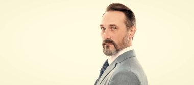 Man face portrait, banner with copy space. mature grizzled man lawyer in businesslike suit isolated on white copy space, business success