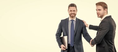 two businessmen colleagues shaking hands after successful business deal, team work. Man face portrait, banner with copy space