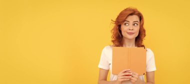 Student or female teacher with book. girl study with book. private teacher holding planner. book lover. back to school. Woman isolated face portrait, banner with mock up copy space