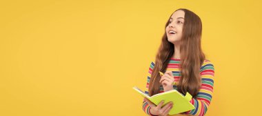 Once upon a time. Happy child write story. Story writer yellow background. Writing lesson. Banner of schoolgirl student. School child pupil portrait with copy space