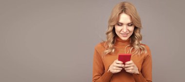 Modern woman girl texting on smartphone. Woman portrait, isolated header banner with copy space
