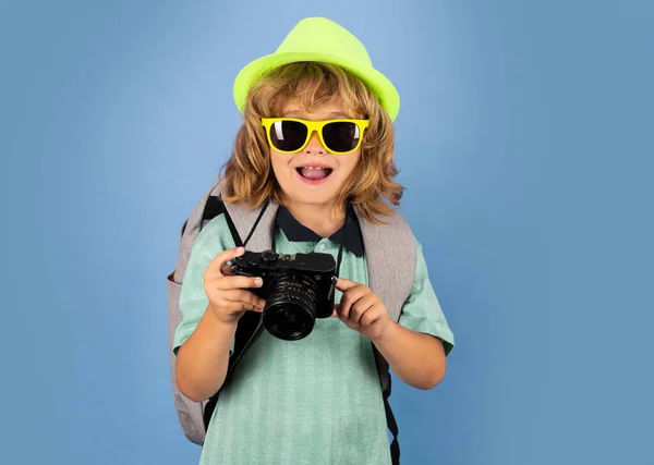 Tourist photographer with camera on travel . Children travel concept