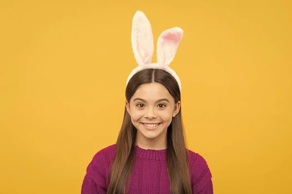looking so cute. time for fun. adorable kid wearing funny hare ears. easter spring holiday. happy teen girl wear bunny ears. happy easter. childhood happiness. child in rabbit costume.
