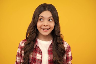 Funny face. Child little girl 12, 13, 14 years old background studio portrait. Childhood lifestyle concept. Close-up portrait of caucasian teenager child