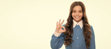 cheerful kid with curly hair. beauty and fashion. female fashion model. Child face, horizontal poster, teenager girl isolated portrait, banner with copy space