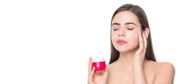 Beauty woman skin. Woman beauty face, close up portrait, isolated banner with copy space. young girl hold hair mask. lady with skin cream. daily habit and personal care