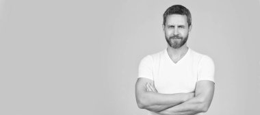 Being confident as a man. Confident unshaven man grey background. Confidence. Man face portrait, banner with copy space