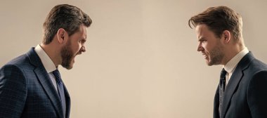 Man face portrait, banner with copy space. disagreed men partners. business competition. businessmeeting. struggle for leadership