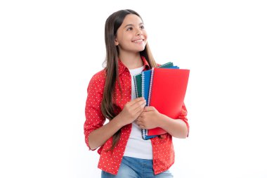Back to school. Teenager schoolgirl with book ready to learn. School girl children on isolated white studio background. Portrait of happy smiling teenage child girl
