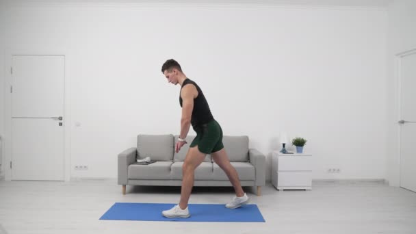 Fitness Man Athlete Exercising Touching Toes Home Gym Fit Athlete — Wideo stockowe