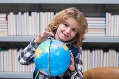 Smart caucasian school boy kid pupil student going back to school. Education kids