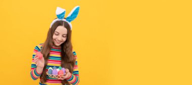 paschal. just having fun. happy childhood. cheerful bunny kid. Easter child horizontal poster. Web banner header of bunny kid, copy space