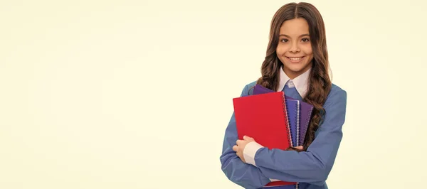 stock image happy face of teen girl with long curly hair hold school workbook isolated on white, school. Banner of schoolgirl student. School child pupil portrait with copy space