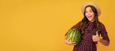 kid with fruit. healthy food for children. fructose healthy eating on summer vacation. Summer girl portrait with watermelon, horizontal poster. Banner header with copy space