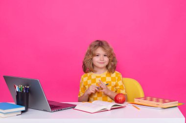 Child from elementary school with book. Little student, clever nerd pupil ready to study. First time to school. Concept of education and learning