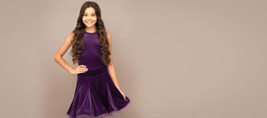 child in purple dance dress. dancing school. Child face, horizontal poster, teenager girl isolated portrait, banner with copy space