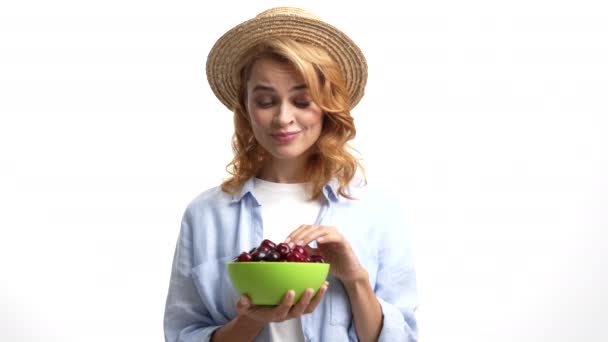 Cute Smiling Woman Farmer Straw Summer Hat Eat Sweet Cherry — Stockvideo
