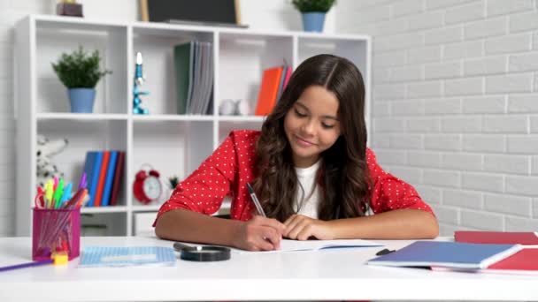 School Child Thinking Homework Assignment While Writing Copybook Desk Education — Stok video