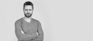 Man face portrait, banner with copy space. handsome mature man with beard on grey background, style