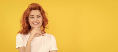 Woman isolated face portrait, banner with copy space. Portrait of beautiful cheerful redhead girl curly hair smiling laughing looking at camera