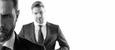 Serious male face. Serious businessman isolated on white. Professional man with unshaven face. Man face portrait, banner with copy space