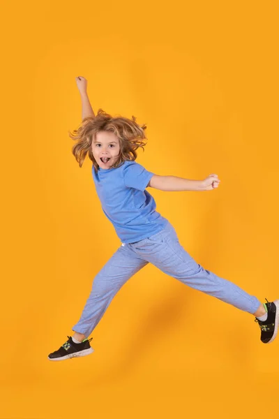 Funny Boy Jumping Little Child Jumping Yellow Background — 스톡 사진