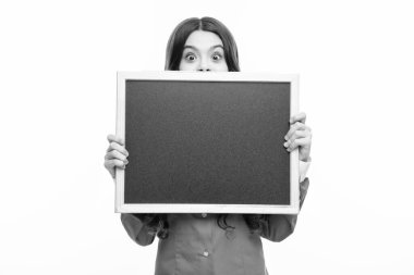 Little girl teen with blackboards on isolated white background. Teenager school girl hold blackboard for copy space, school sale