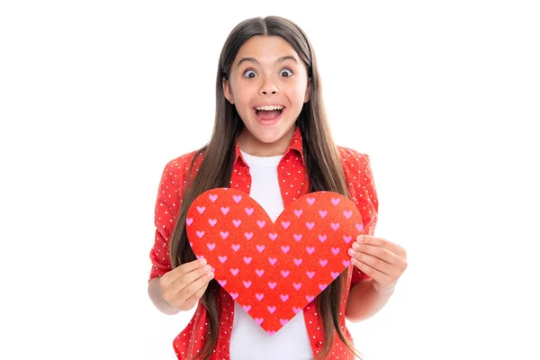 stock image Valentines Day. Dreaming cute teen child with red heart. Portrait of emotional amazed excited teen girl