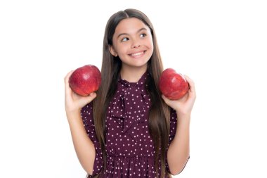 Spring everywhere. spring season fruits. full of vitamins. organic food only. natural and healthy. happy childhood. kid eat apple. child with fruit. Portrait of happy smiling teenage child girl