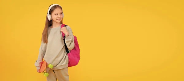 Happy Teen Girl Kid School Backpack Penny Board Listen Music — Zdjęcie stockowe