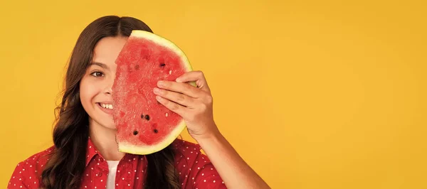 Stock image yummy juicy watermelon. kid with fruit. healthy food for children. fructose healthy eating. Summer girl portrait with watermelon, horizontal poster. Banner header with copy space