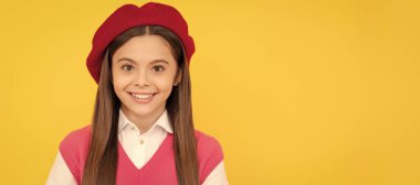back to school. cheerful kid in beret ready to study. smiling child with book. teenage student. Child face, horizontal poster, teenager girl isolated portrait, banner with copy space