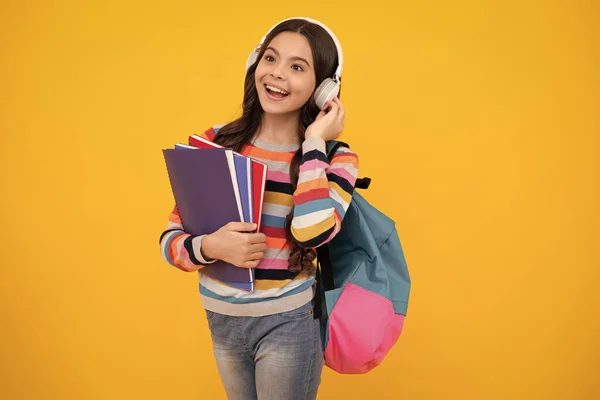 School Girl Teenage Student Headphones Hold Books Yellow Isolated Studio — ストック写真