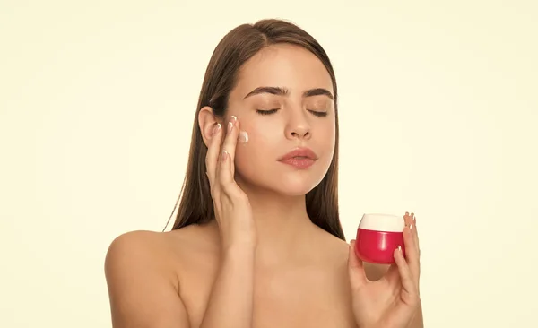 young girl hold hair mask. lady with skin cream. daily habit and personal care. skincare beauty. beauty cosmetic. cleansing scrub. presenting female cosmetic product. woman applying face cream.