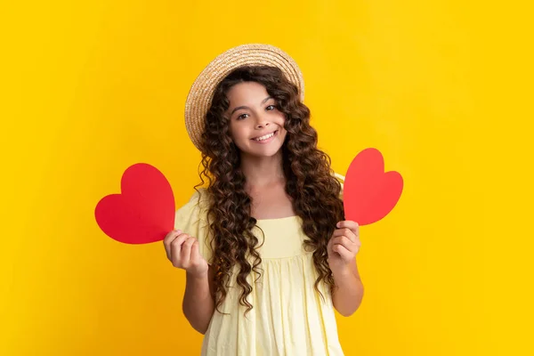 stock image Lovely child teen girl with shape heart love holiday and valentine symbol. Valentine or birthday day. Gift heart present. Happy teenager, positive and smiling emotions of teen girl