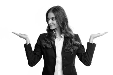 Woman point at copy space, showing copyspace pointing. Promo, girl showing advertisement content gesture, pointing with hand recommend product. Isolated white background