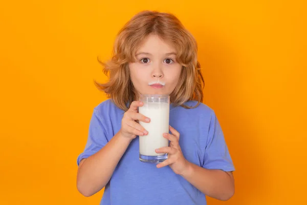Little Child Drinking Milk Kid Glass Milk Yellow Isolated Background — Stok fotoğraf